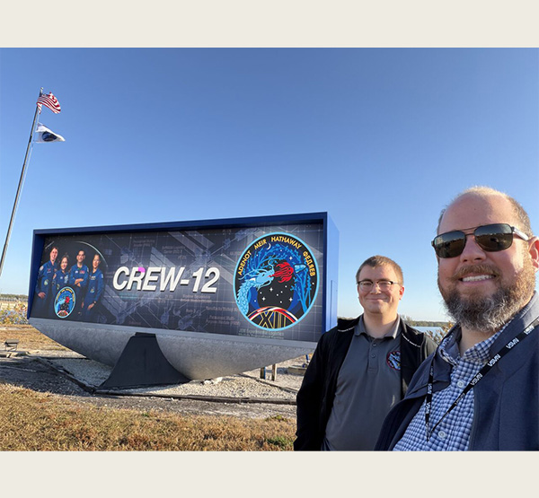 Jeff Triplett and Tim Gregoire, a system administrator in the FSL, pictured at the flag raising ceremony for Crew-12 Launch (photo courtesy of Jeff Triplett).