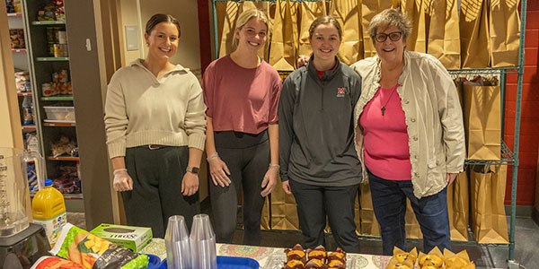 From left to right: Sophie Arnold, a Dietetic Intern; Ellie Carr, KNH 420 Dietetic Field Experience student; Lauren Oskam, a Master's of Athletic Training student; and Nancy Parkinson, senior clinical lecturer for Kinesiology, Nutrition, and Health.