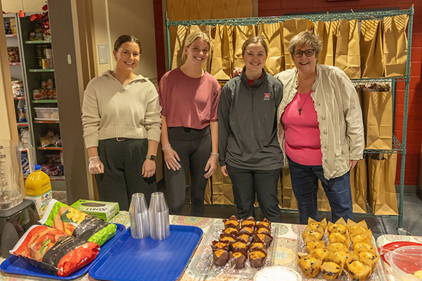 From left to right: Sophie Arnold, a Dietetic Intern; Ellie Carr, KNH 420 Dietetic Field Experience student; Lauren Oskam, a Master's of Athletic Training student; and Nancy Parkinson, senior clinical lecturer for Kinesiology, Nutrition, and Health. 