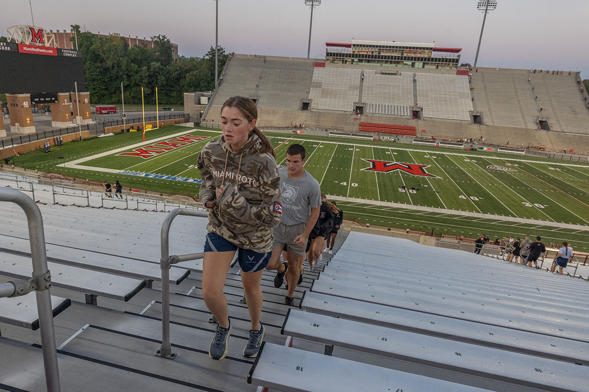 Miami University students climb the stairs at Yager Stadium on Thursday as part of the 9/11 Memorial Stair Climb