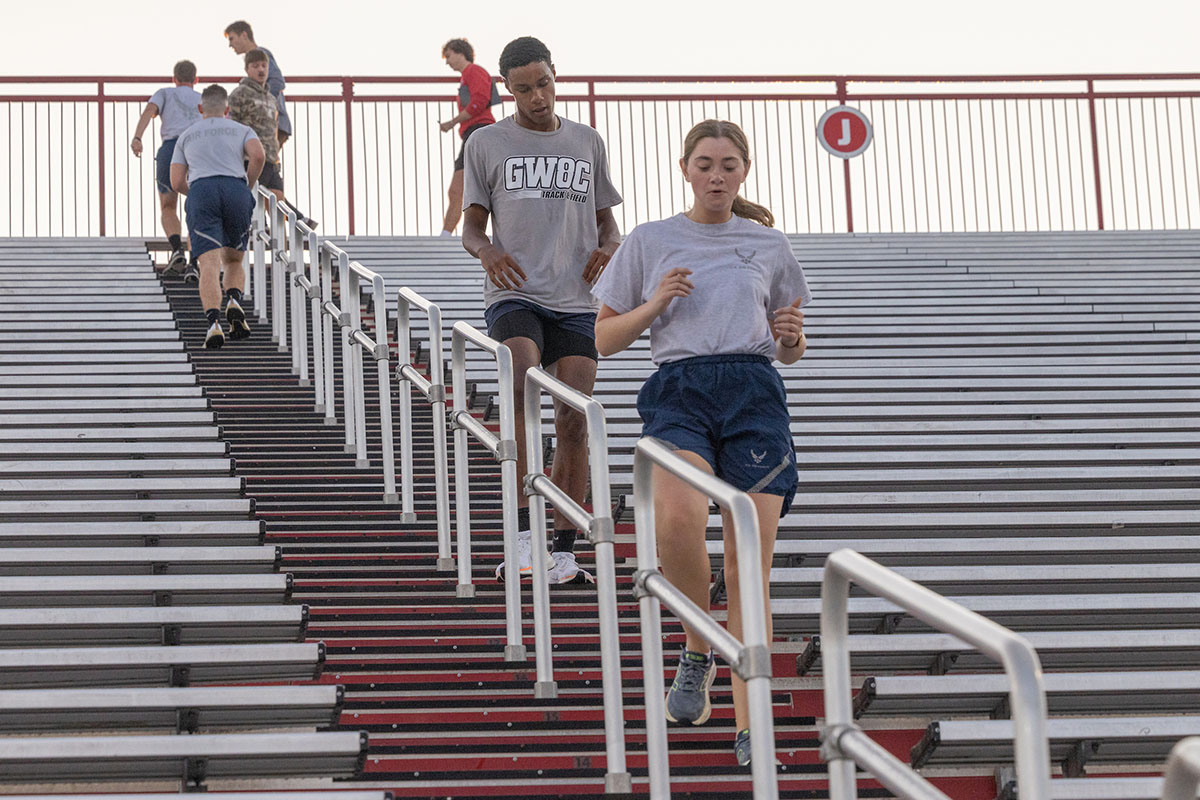 Miami University students climb the stairs at Yager Stadium on Thursday as part of the 9/11 Memorial Stair Climb