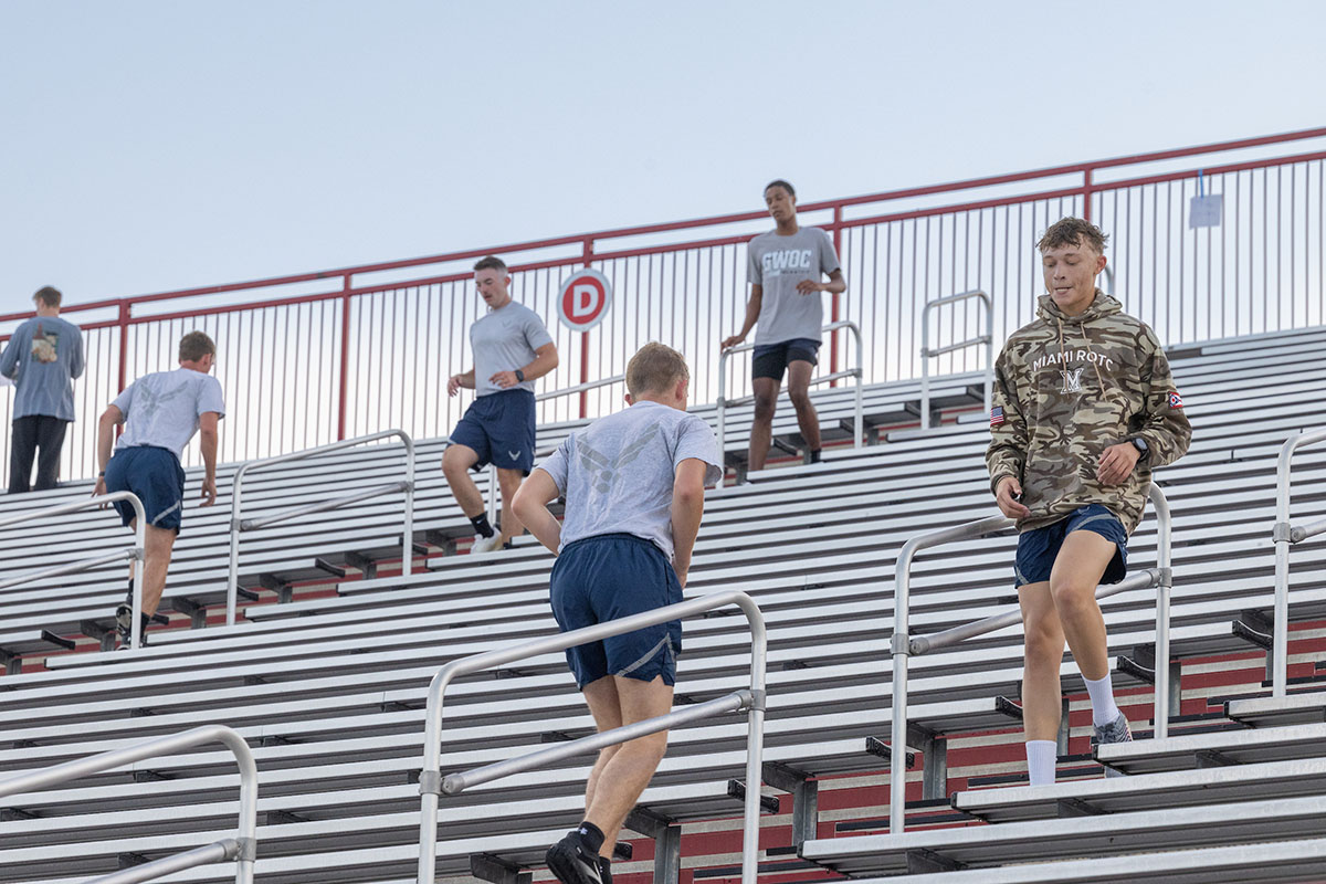 Miami University students climb the stairs at Yager Stadium on Thursday as part of the 9/11 Memorial Stair Climb