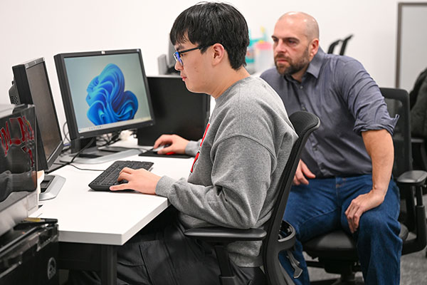 Miami University graduate student Ethan Han, left, and John Femiani, professor of Computer Science and Software Engineering