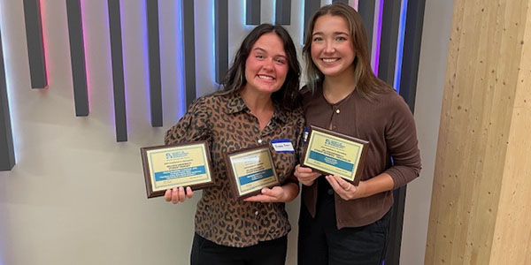 Anna Reier and Taylor Stumbaugh of the Miami Student