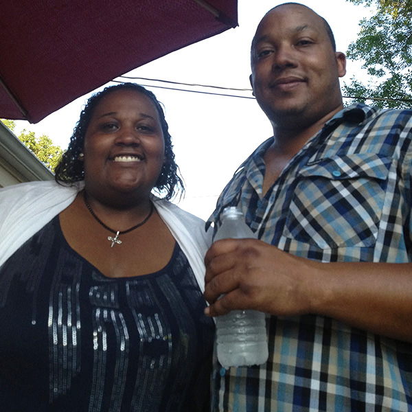 Mathews with her brother, Calvin “CJ” Simmons Jr., at a barbecue at his home in 2014 (photo courtesy of Mathews).